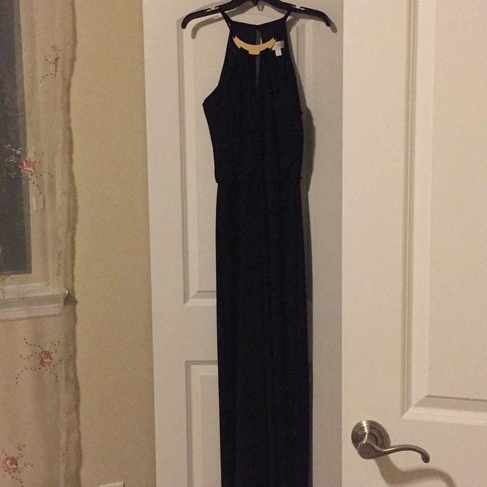 Black romper with gold neck detail